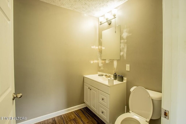 4148 New Home Rd, Smithville, TN 37166 - half bath featuring vanity, a textured ceiling, and wood finished floors