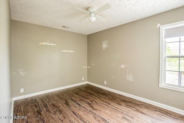 4148 New Home Rd, Smithville, TN 37166 - empty room featuring wood finished floors, a ceiling fan, and a textured ceiling