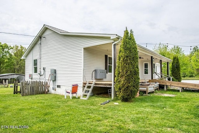4148 New Home Rd, Smithville, TN 37166 - back of property featuring a lawn, ceiling fan, and crawl space