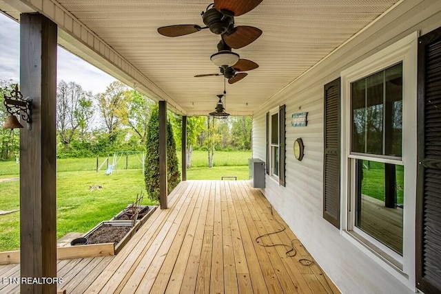 4148 New Home Rd, Smithville, TN 37166 - wooden terrace featuring a lawn and a ceiling fan