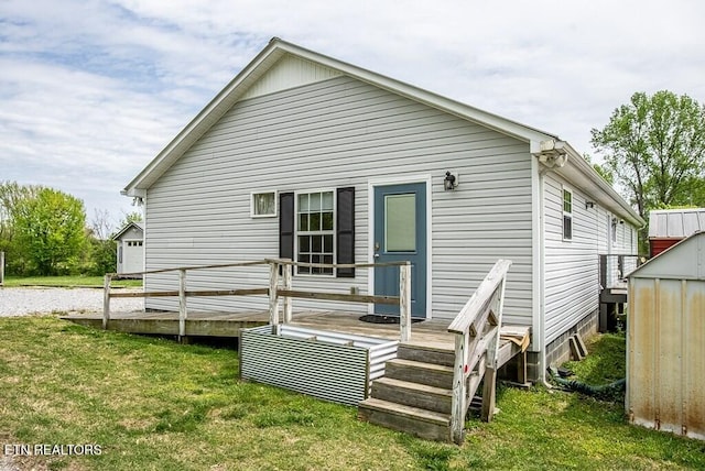 4148 New Home Rd, Smithville, TN 37166 - back of house with a deck and a yard