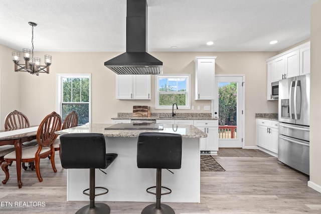 177 Hidden River Ave, Sparta, TN 38583 - kitchen featuring island range hood, stainless steel appliances, a center island, white cabinetry, and recessed lighting
