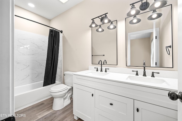 177 Hidden River Ave, Sparta, TN 38583 - bathroom featuring double vanity, shower / tub combo with curtain, and wood finished floors