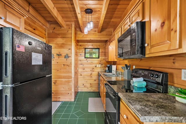 2011 Ridgecrest Loop Ln, Sevierville, TN 37876 - kitchen with black appliances, a wooden ceiling with exposed beams, dark tile patterned floors, wood walls, and dark countertops