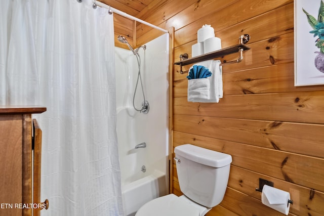 2011 Ridgecrest Loop Ln, Sevierville, TN 37876 - bathroom with shower / bathtub combination with curtain and wood walls
