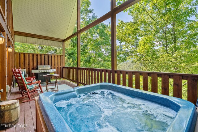 2011 Ridgecrest Loop Ln, Sevierville, TN 37876 - wooden deck with a grill and an outdoor hot tub
