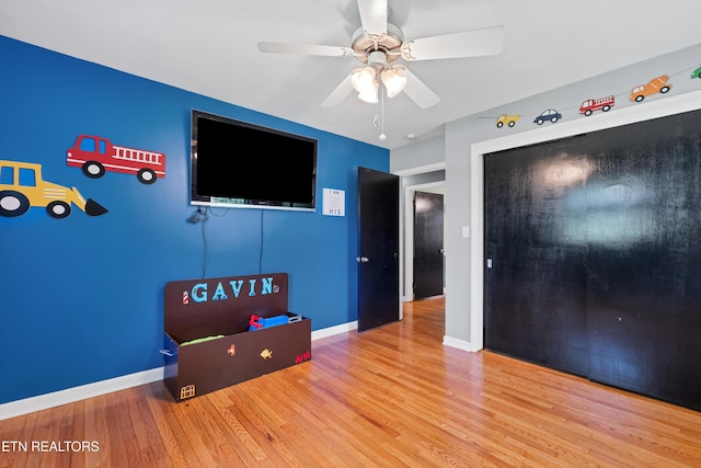 898 W Cunningham St, Alcoa, TN 37701 - unfurnished bedroom with wood finished floors, a closet, and ceiling fan