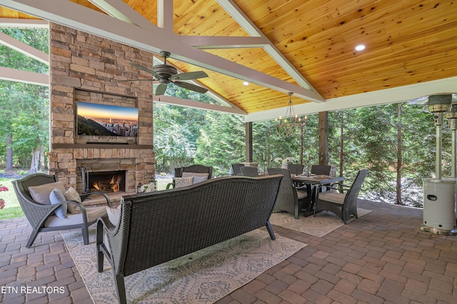 920 Andover View Ln, Knoxville, TN 37922 - view of patio with ceiling fan, outdoor dining space, and an outdoor living space with a fireplace