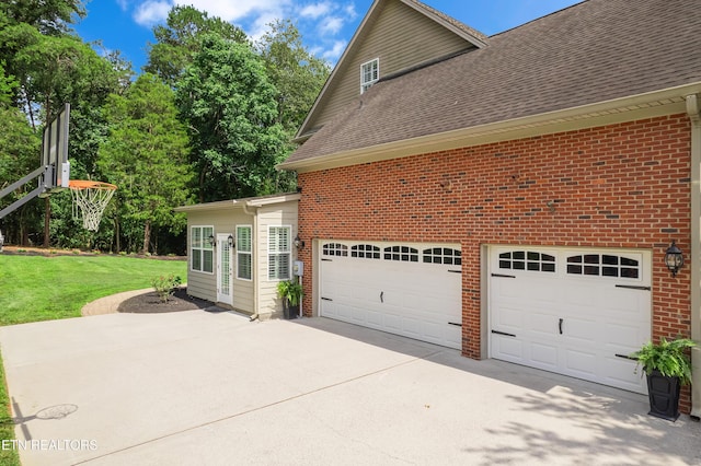 920 Andover View Ln, Knoxville, TN 37922 - view of side of property with concrete driveway, roof with shingles, brick siding, and a yard