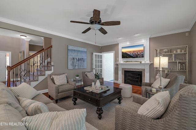 920 Andover View Ln, Knoxville, TN 37922 - living area featuring ceiling fan, a fireplace, crown molding, wood finished floors, and stairway