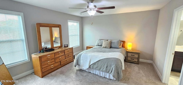 3038 Lazy River Dr, Knoxville, TN 37931 - bedroom featuring light colored carpet and a ceiling fan