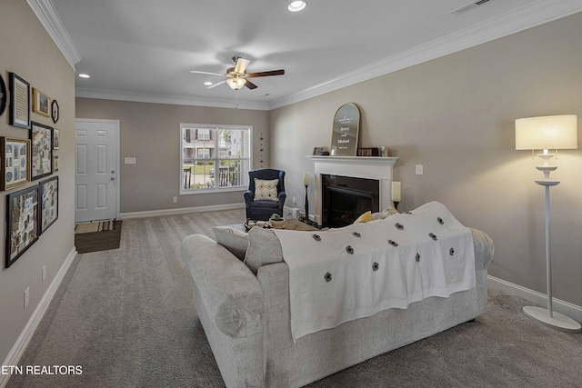3038 Lazy River Dr, Knoxville, TN 37931 - carpeted living area with ceiling fan, crown molding, recessed lighting, and a glass covered fireplace