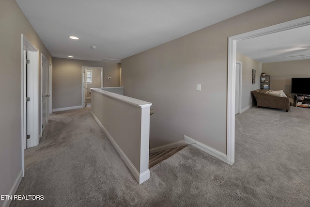 3038 Lazy River Dr, Knoxville, TN 37931 - hall with an upstairs landing, light colored carpet, and recessed lighting