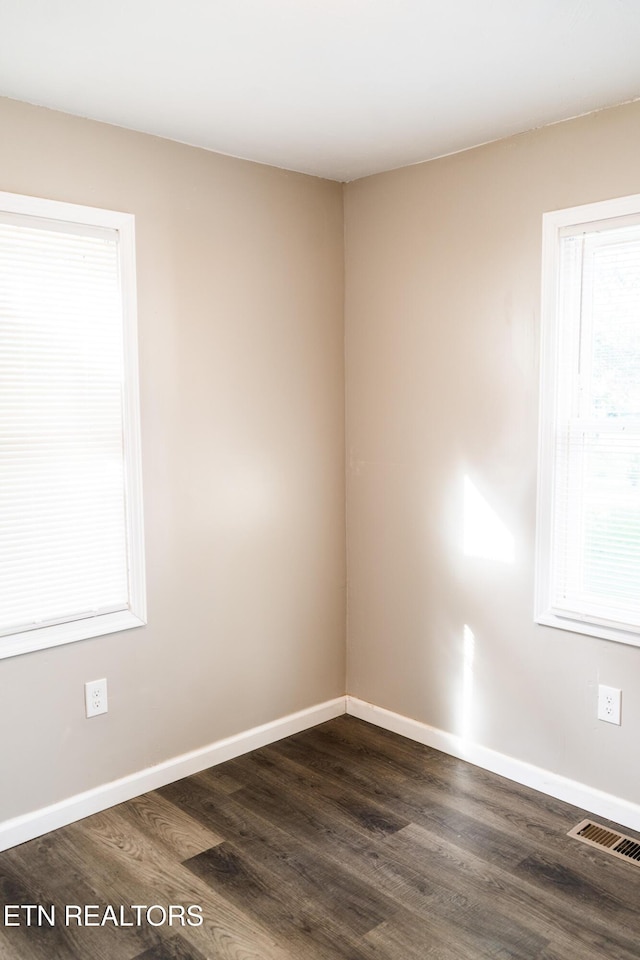 711 E Mountcastle St, Jefferson City, TN 37760 - empty room featuring dark wood finished floors and baseboards