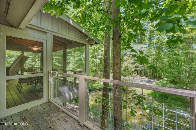 2991 Walden Flats Way, Sevierville, TN 37862 - wooden deck with a sunroom