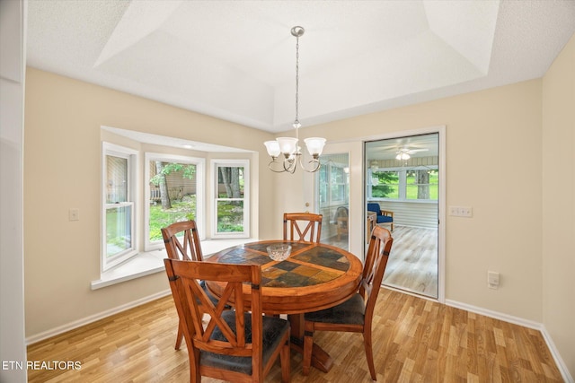 103 Wickham Ln, Fairfield Glade, TN 38558 - dining room featuring light wood-style flooring and a chandelier