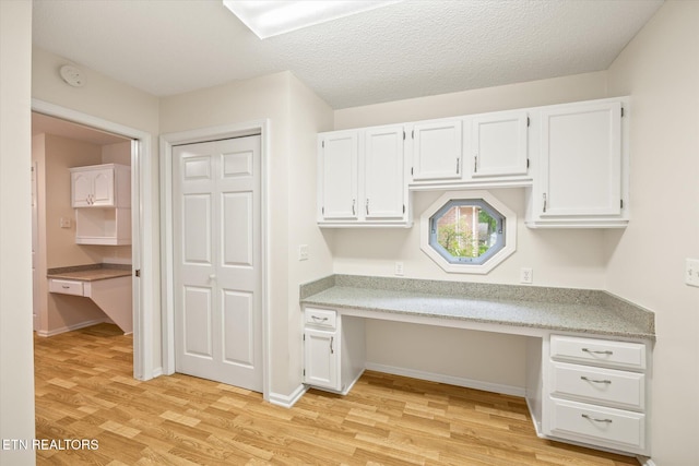 103 Wickham Ln, Fairfield Glade, TN 38558 - unfurnished office with built in desk and light wood-style flooring