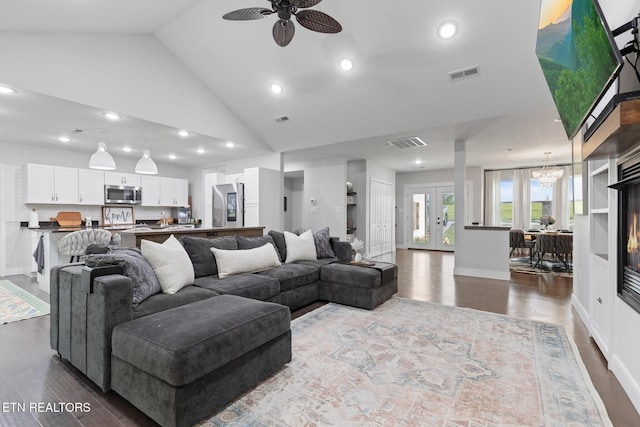 9401 Shirley Ann Rd, Kodak, TN 37764 - living room featuring dark wood-style floors, ceiling fan, recessed lighting, a chandelier, and high vaulted ceiling