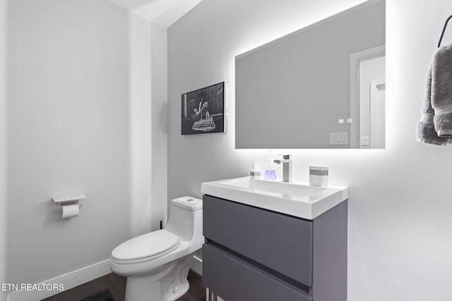 9401 Shirley Ann Rd, Kodak, TN 37764 - half bathroom with vanity and wood finished floors