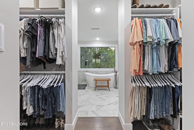 9401 Shirley Ann Rd, Kodak, TN 37764 - spacious closet featuring marble look tile flooring