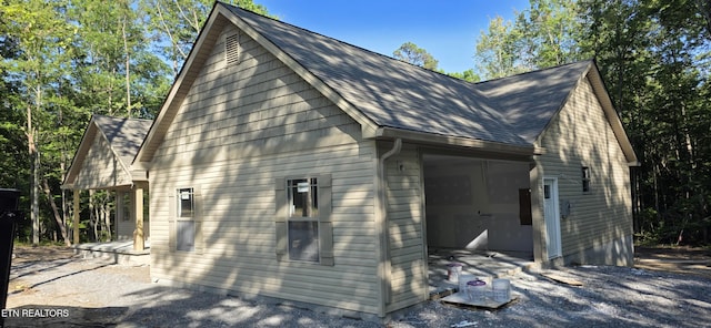 2333 Arrow Trl, Monterey, TN 38574 - view of side of home featuring a shingled roof