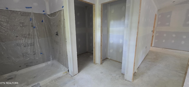 2333 Arrow Trl, Monterey, TN 38574 - bathroom featuring unfinished concrete floors and a shower