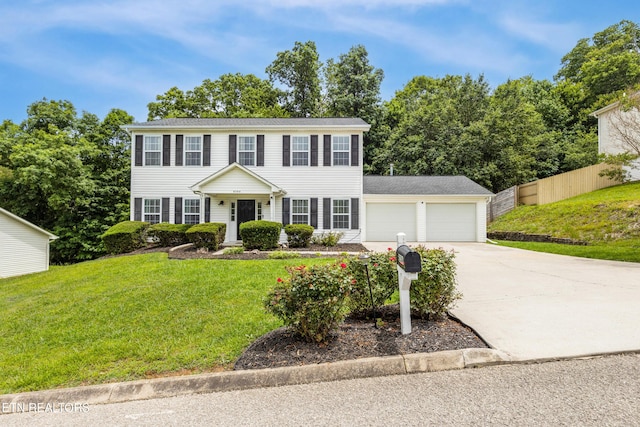 8306 Foxworth Trl, Powell, TN 37849 - colonial home featuring an attached garage and driveway