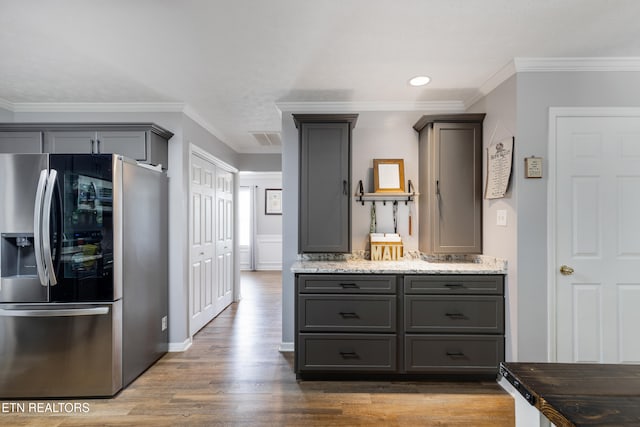 8306 Foxworth Trl, Powell, TN 37849 - bathroom featuring wood finished floors, ornamental molding, vanity, and recessed lighting