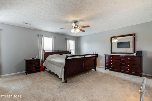 8306 Foxworth Trl, Powell, TN 37849 - bedroom with a textured ceiling, carpet floors, and a ceiling fan