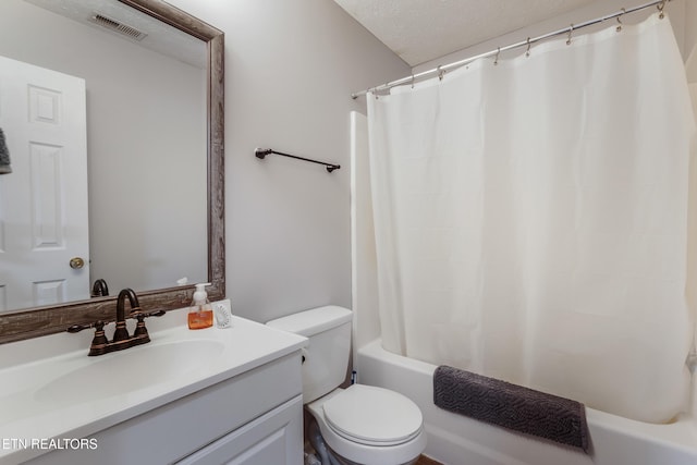 8306 Foxworth Trl, Powell, TN 37849 - bathroom featuring vanity, shower / bath combo, and a textured ceiling