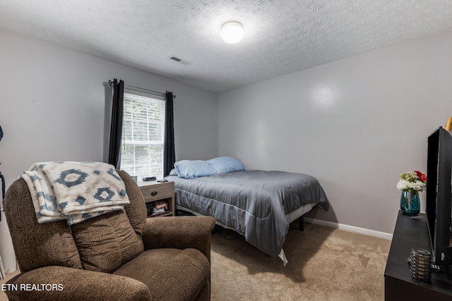 8306 Foxworth Trl, Powell, TN 37849 - carpeted bedroom with a textured ceiling and baseboards