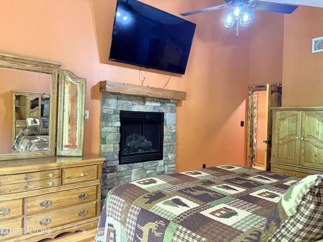 1659 Cherohala Skwy, Tellico Plains, TN 37385 - bedroom featuring a fireplace, a ceiling fan, and a high ceiling