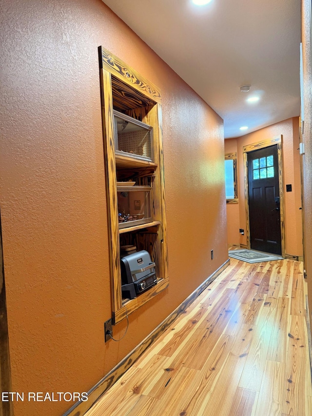 1659 Cherohala Skwy, Tellico Plains, TN 37385 - foyer entrance featuring wood finished floors, a textured wall, and recessed lighting