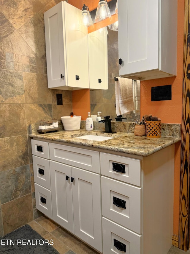 1659 Cherohala Skwy, Tellico Plains, TN 37385 - kitchen featuring white cabinets and light stone countertops