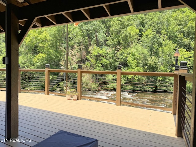 1659 Cherohala Skwy, Tellico Plains, TN 37385 - wooden terrace featuring a forest view and a water view