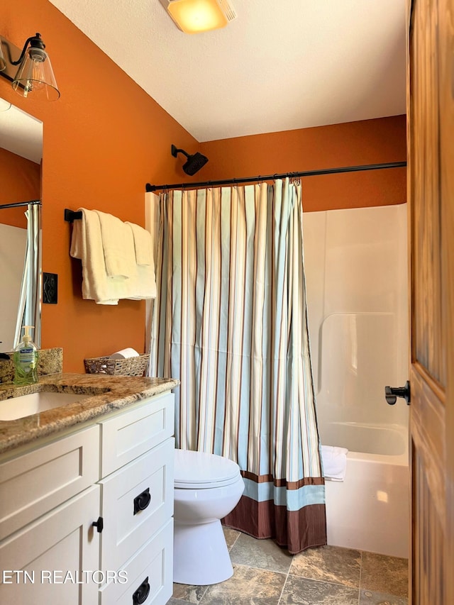1659 Cherohala Skwy, Tellico Plains, TN 37385 - full bath with vanity, shower / bathtub combination with curtain, and stone finish flooring