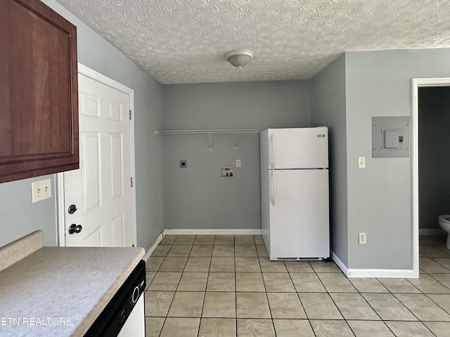 1582 Meadow Springs Dr, Jefferson City, TN 37760 - washroom featuring electric panel, electric dryer hookup, hookup for a washing machine, light tile patterned floors, and a textured ceiling