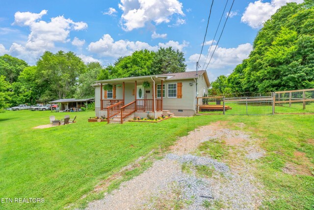 555 N Trigonia Rd, Greenback, TN 37742 - view of front of house with crawl space, a gate, driveway, and covered porch