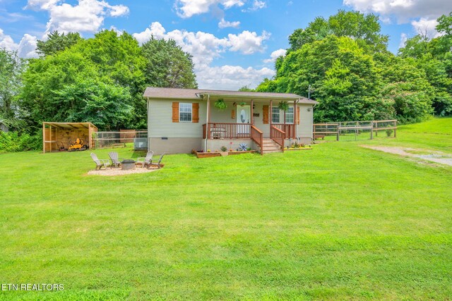 555 N Trigonia Rd, Greenback, TN 37742 - view of front of property featuring a fire pit and a porch