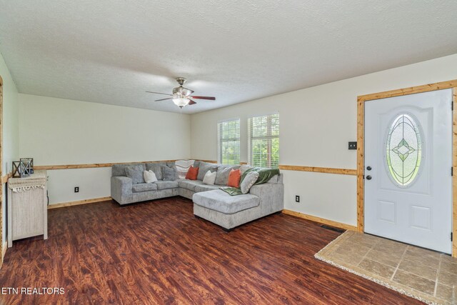 555 N Trigonia Rd, Greenback, TN 37742 - living room featuring wood finished floors, ceiling fan, and a textured ceiling