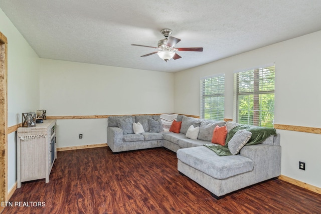 555 N Trigonia Rd, Greenback, TN 37742 - living area featuring dark wood-type flooring, a ceiling fan, and a textured ceiling