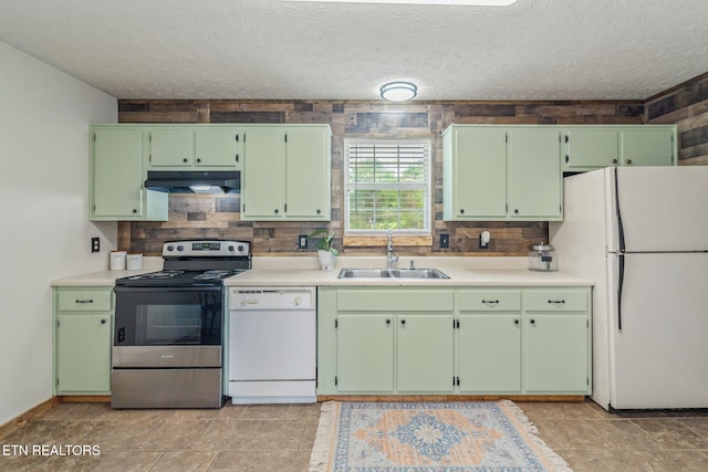 555 N Trigonia Rd, Greenback, TN 37742 - kitchen with white appliances, under cabinet range hood, tasteful backsplash, light countertops, and a textured ceiling