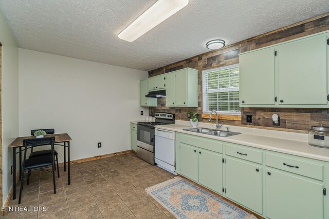 555 N Trigonia Rd, Greenback, TN 37742 - kitchen with white dishwasher, stainless steel electric range oven, tasteful backsplash, a textured ceiling, and light countertops
