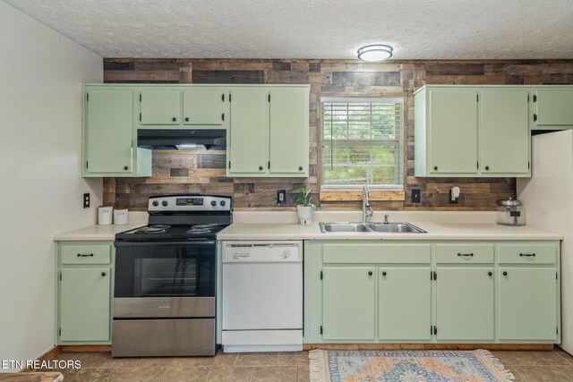 555 N Trigonia Rd, Greenback, TN 37742 - kitchen featuring white dishwasher, electric stove, a textured ceiling, under cabinet range hood, and light countertops