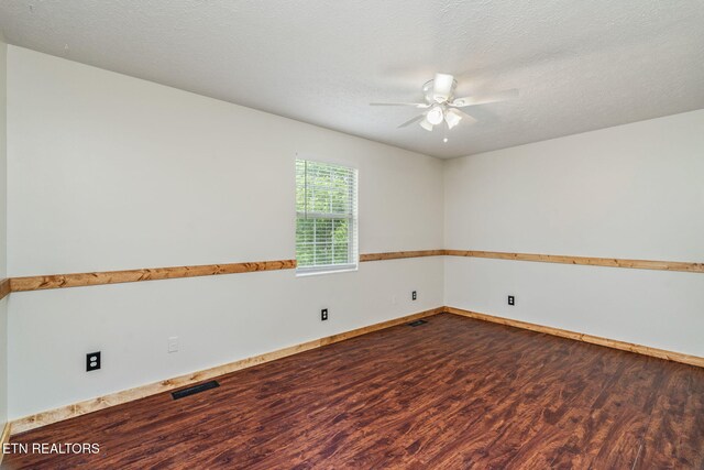555 N Trigonia Rd, Greenback, TN 37742 - unfurnished room with ceiling fan and dark wood-style flooring