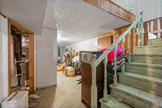 330 Dilbeck Ln, Caryville, TN 37714 - staircase featuring a textured ceiling and baseboards