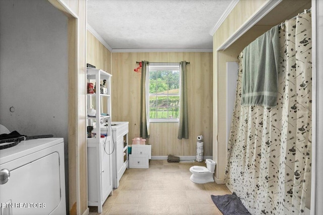 330 Dilbeck Ln, Caryville, TN 37714 - laundry room featuring ornamental molding, washing machine and clothes dryer, and a textured ceiling