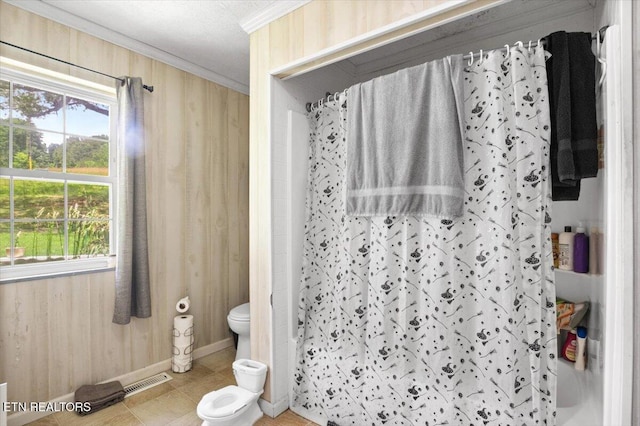 330 Dilbeck Ln, Caryville, TN 37714 - bathroom with ornamental molding, wooden walls, and a shower with curtain
