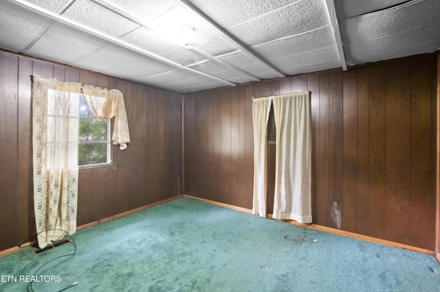 807 E E Chestnut St, Lafollette, TN 37766 - unfurnished room with carpet flooring and wooden walls