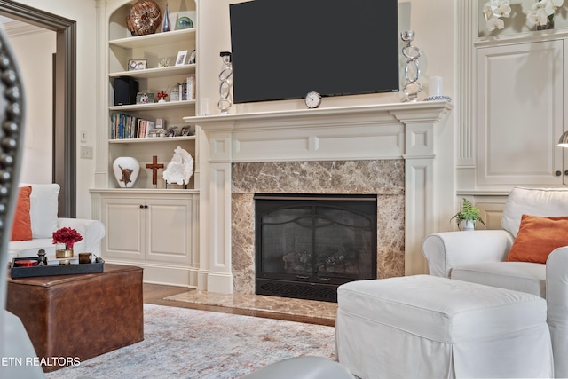 12209 Preston Landing Way, Knoxville, TN 37922 - living room featuring a premium fireplace and built in shelves